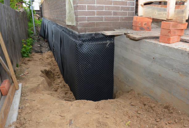 Happy homeowners after waterproofing job in North Olmsted